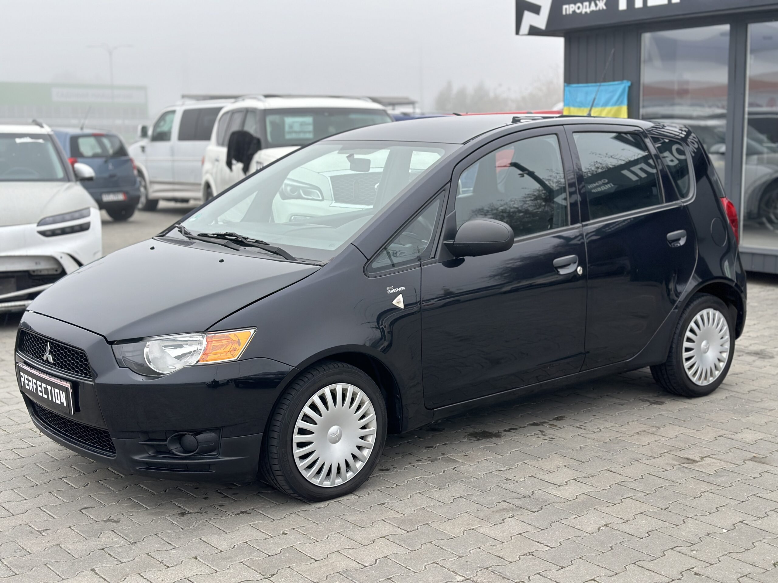 MITSUBISHI COLT 2009 року
